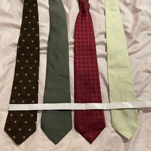 4 men’s ties. Need to be dry cleaned but in good condition.